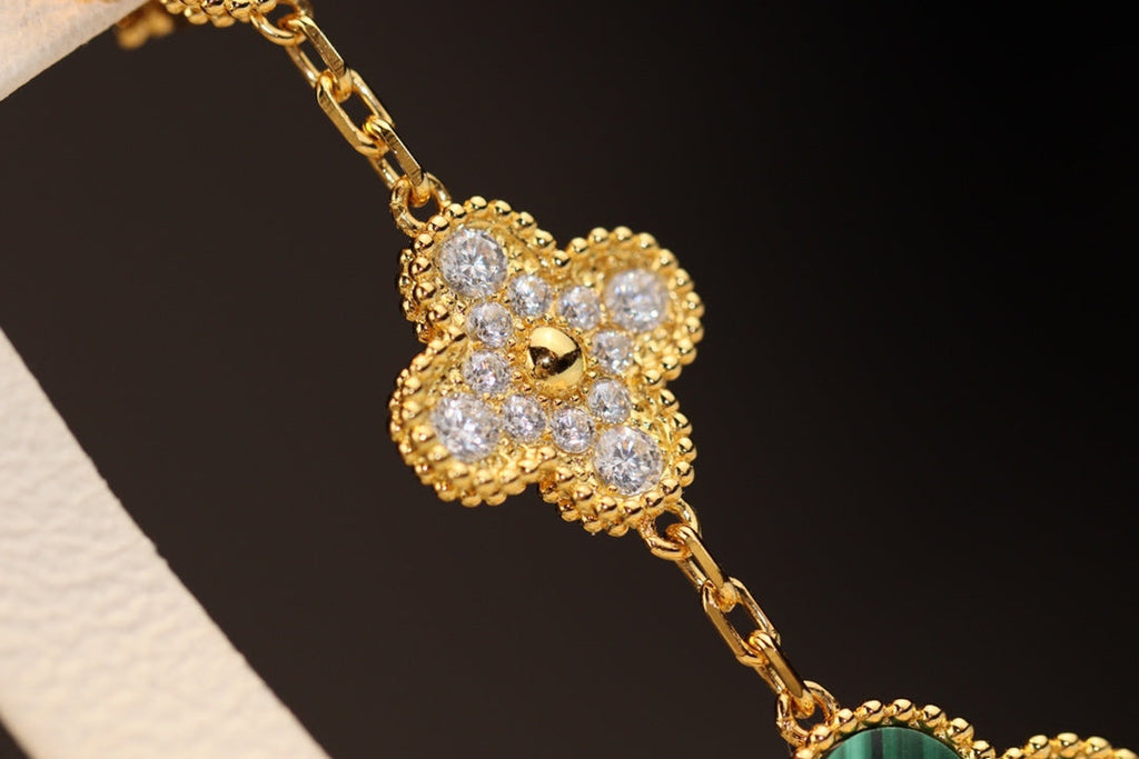 Aura CLOVER OHRRINGE GOLD MALACHIT DIAMANT 3 MOTIVE