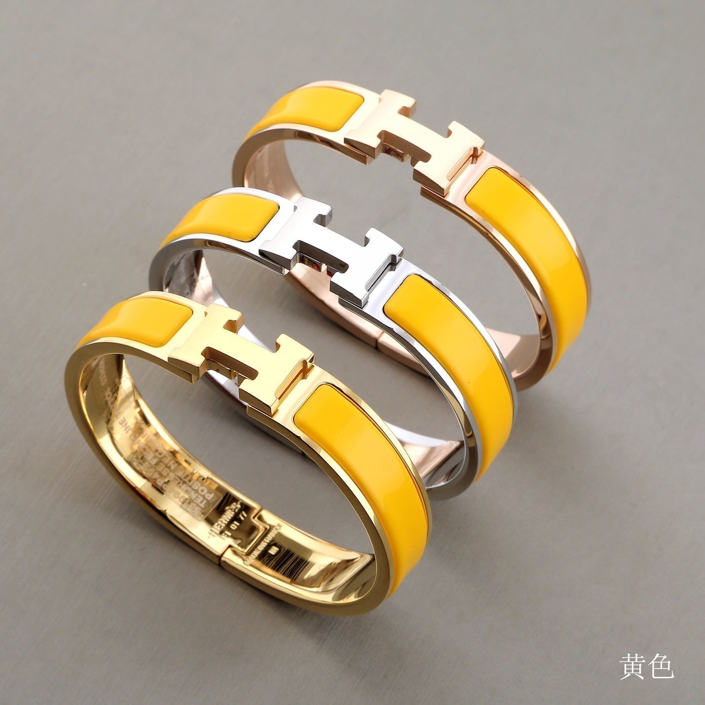 Aura H GELBES ARMBAND