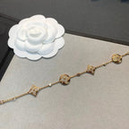 Aura Stern- und Sonnenarmband mit 4 Motiven aus Gold und Diamanten