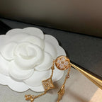 Aura Stern- und Sonnenarmband mit 4 Motiven aus Gold und Diamanten