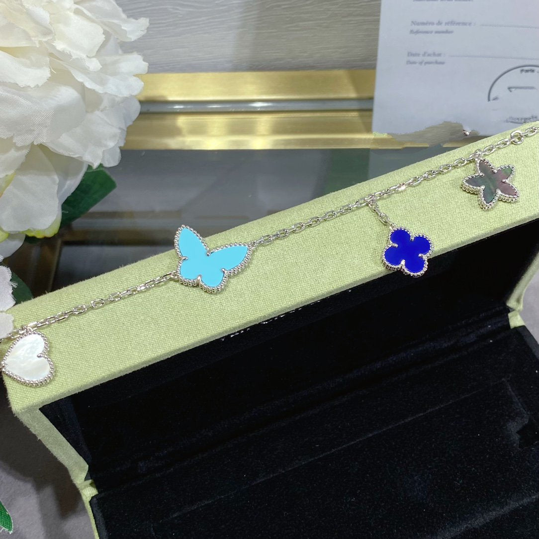 Aura LUCKY SPRING SILBERARMREIF 4 MOTIVE