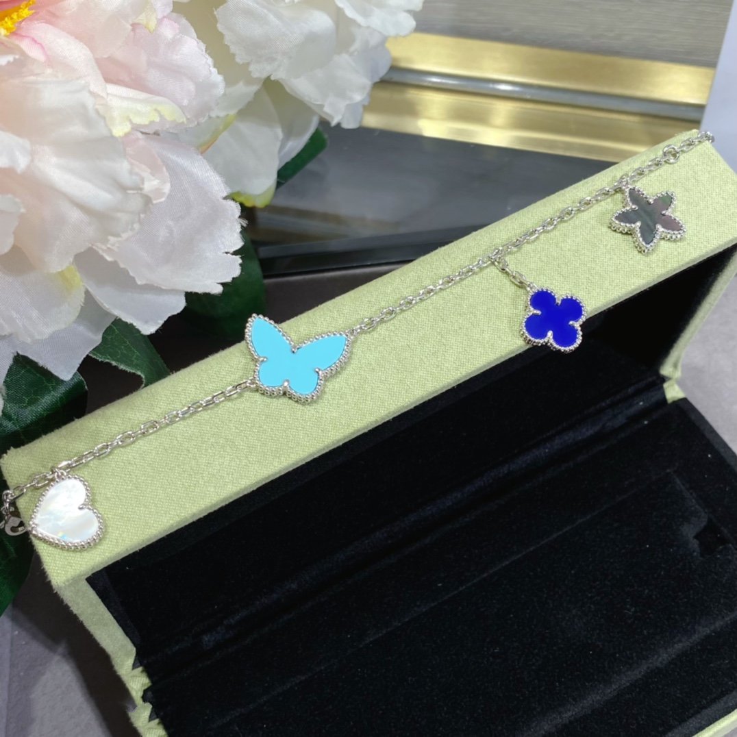 Aura LUCKY SPRING SILBERARMREIF 4 MOTIVE