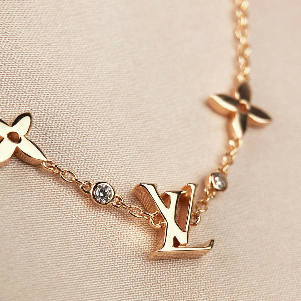 Aura STAR AND SUN 7 MOTIFS GOLD-ARMBAND