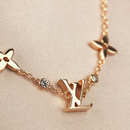 Aura STAR AND SUN 7 MOTIFS GOLD-ARMBAND