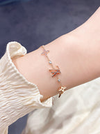 Aura STAR AND SUN 7 MOTIFS GOLD-ARMBAND