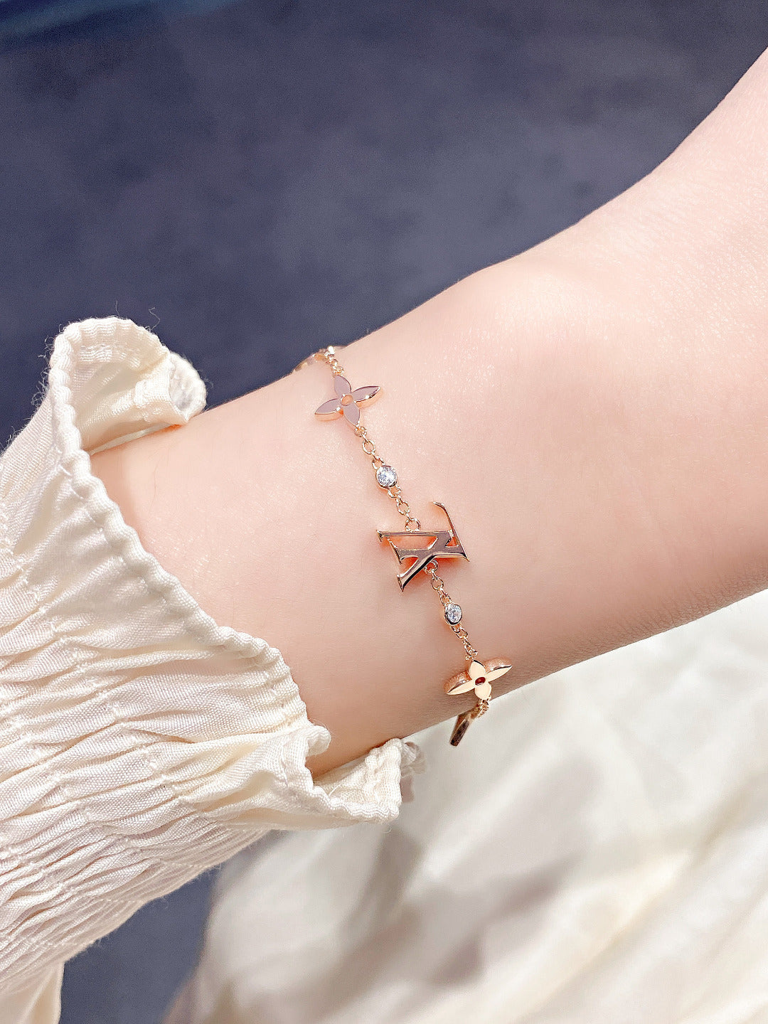 Aura STAR AND SUN 7 MOTIFS GOLD-ARMBAND