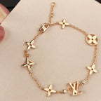 Aura STAR AND SUN 7 MOTIFS GOLD-ARMBAND