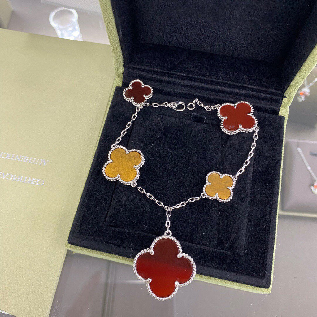 Aura CLOVER 5 MOTIFS SILBER CORNALIN TIGERAUGE ARMBAND