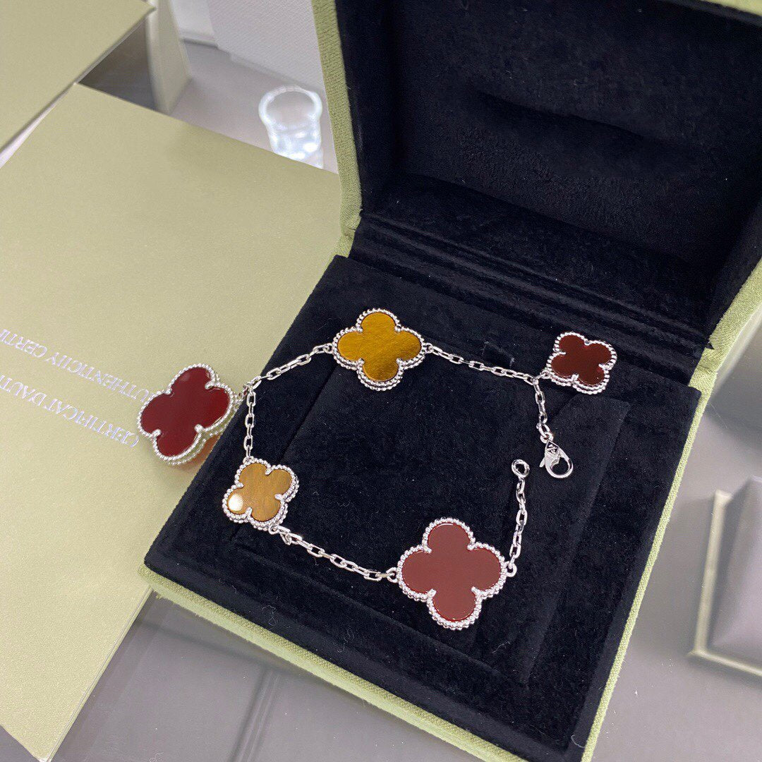 Aura CLOVER 5 MOTIFS SILBER CORNALIN TIGERAUGE ARMBAND