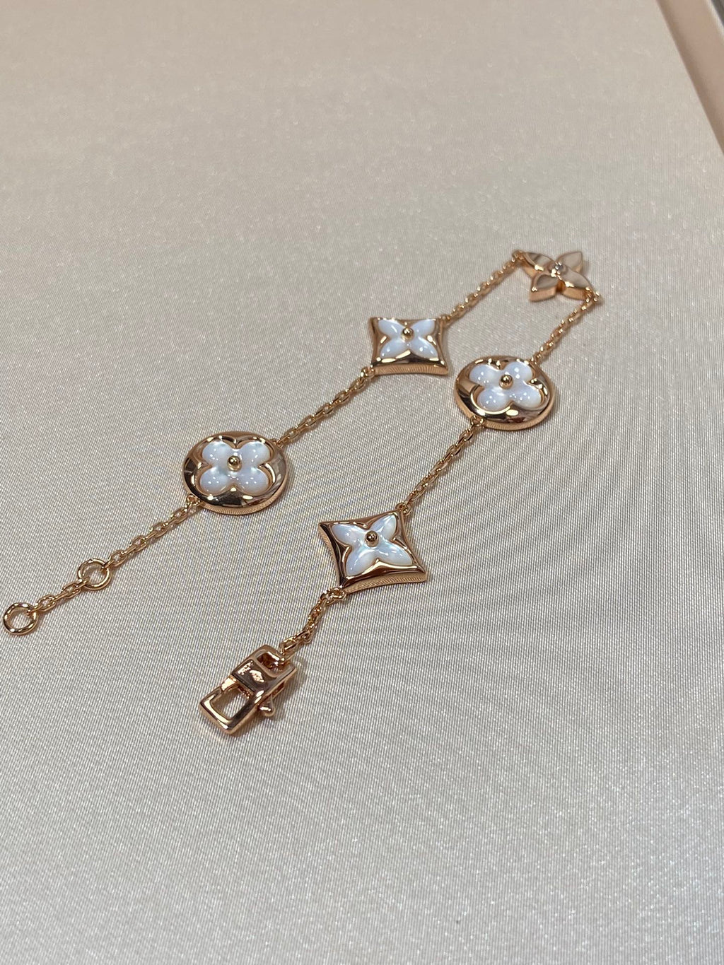 Aura STAR AND SUN 5 MOTIF MOP PINK GOLD BRACELET
