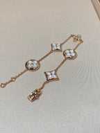 Aura STAR AND SUN 5 MOTIF MOP PINK GOLD BRACELET