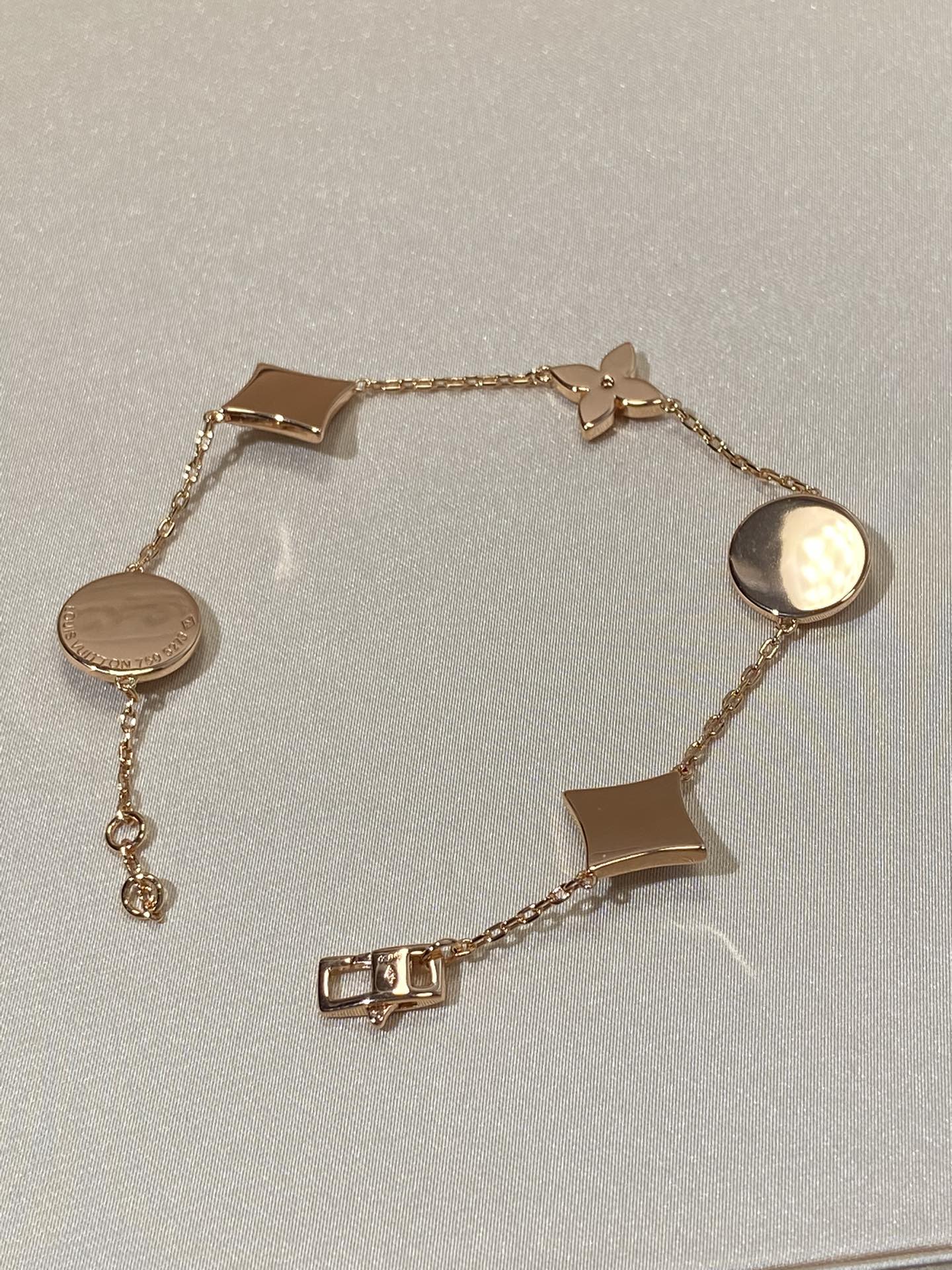 Aura STAR AND SUN 5 MOTIF MOP PINK GOLD BRACELET