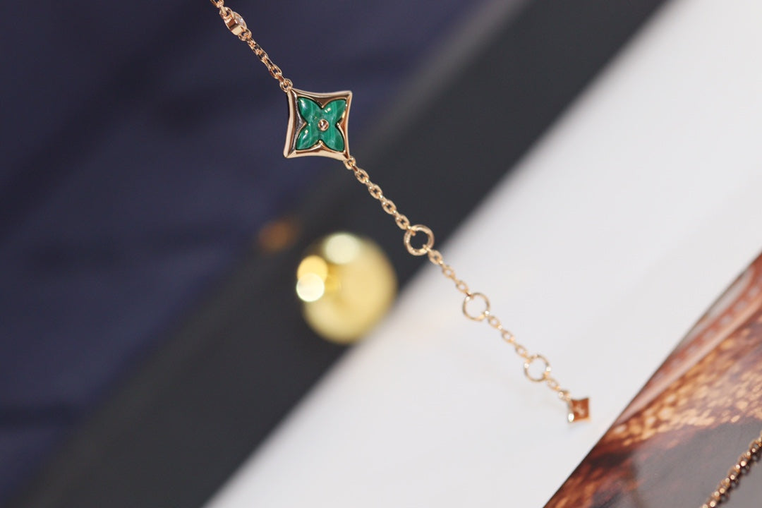 Aura STAR AND SUN 4 MOTIF PINK GOLD MALACHITE BRACELET