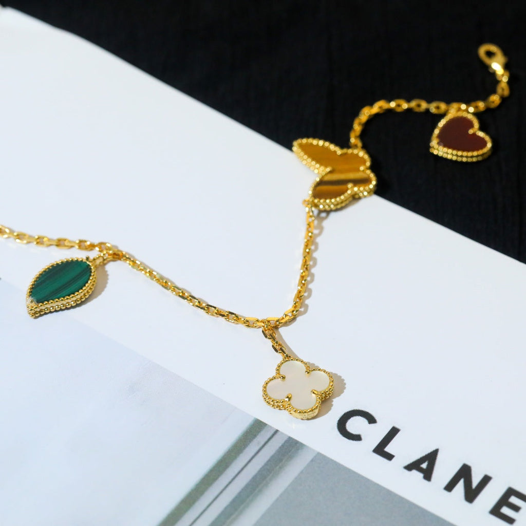 Aura LUCKY SPRING 5 MOTIF GOLD BRACELET