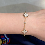 Aura STAR AND SUN 4 MOTIF WHITE MOP PINK GOLD BRACELET