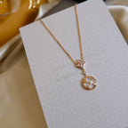 Aura Stern- und Sonnen-Perlmutt-2-Motiv-Halskette in Roségold
