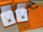 Aura HM CLIC GELB EMAILLE GOLDHALSKETTE