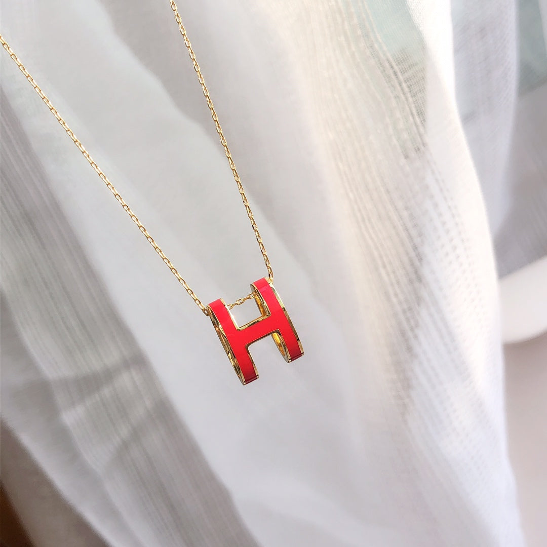 Aura HM CLIC RED ENAMEL GOLD NECKLACE