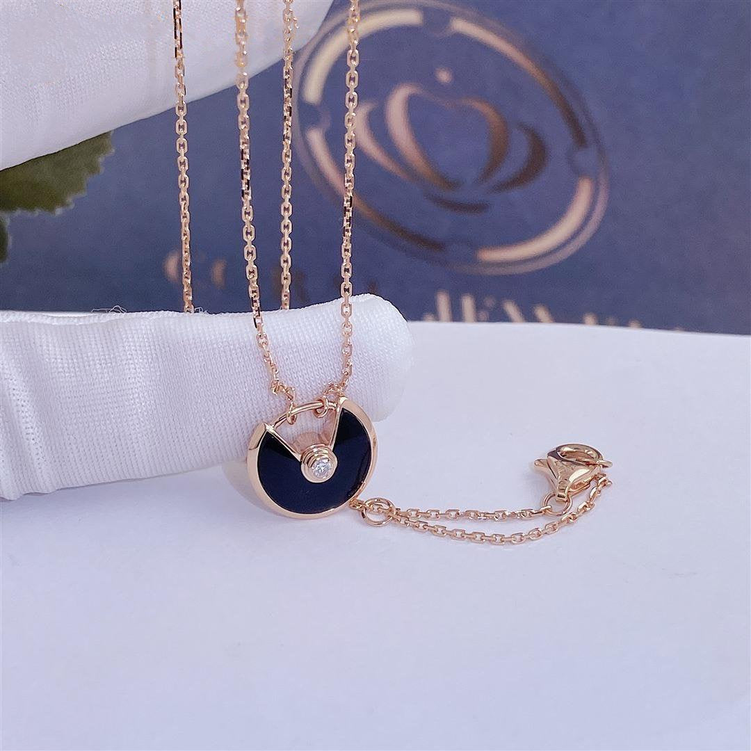 Aura AMULETTE ROSÉGOLD ONYX-HALSKETTE