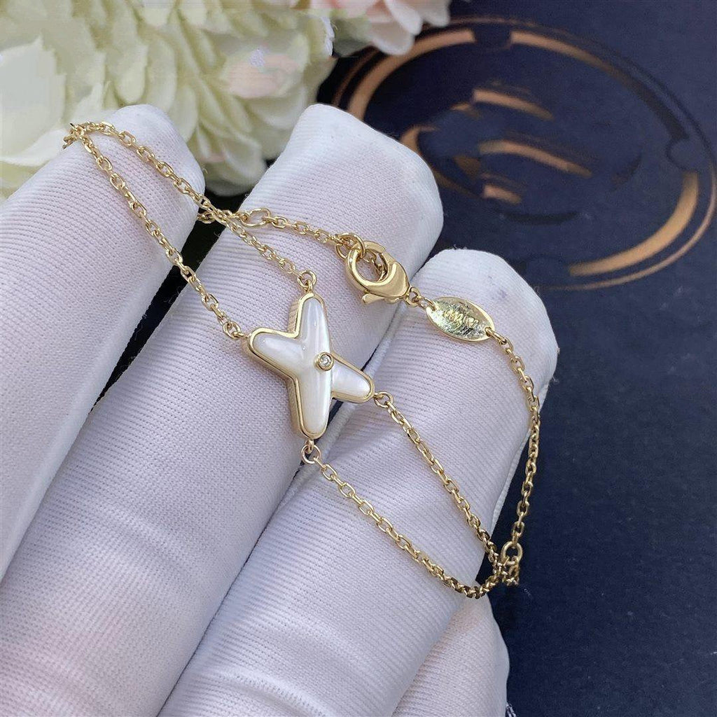 Aura JEUX ARMBAND WEISS PERLMUTT GOLD 1 DIAMANT