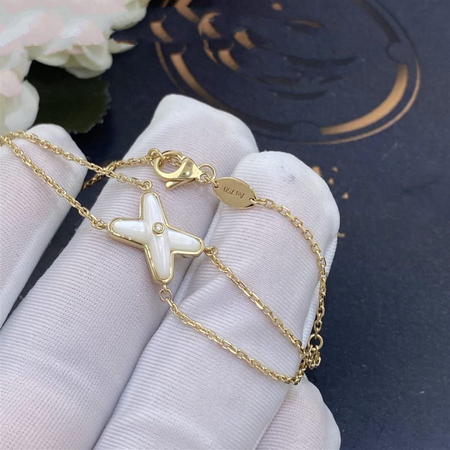 Aura JEUX ARMBAND WEISS PERLMUTT GOLD 1 DIAMANT