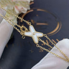 Aura JEUX ARMBAND WEISS PERLMUTT GOLD 1 DIAMANT