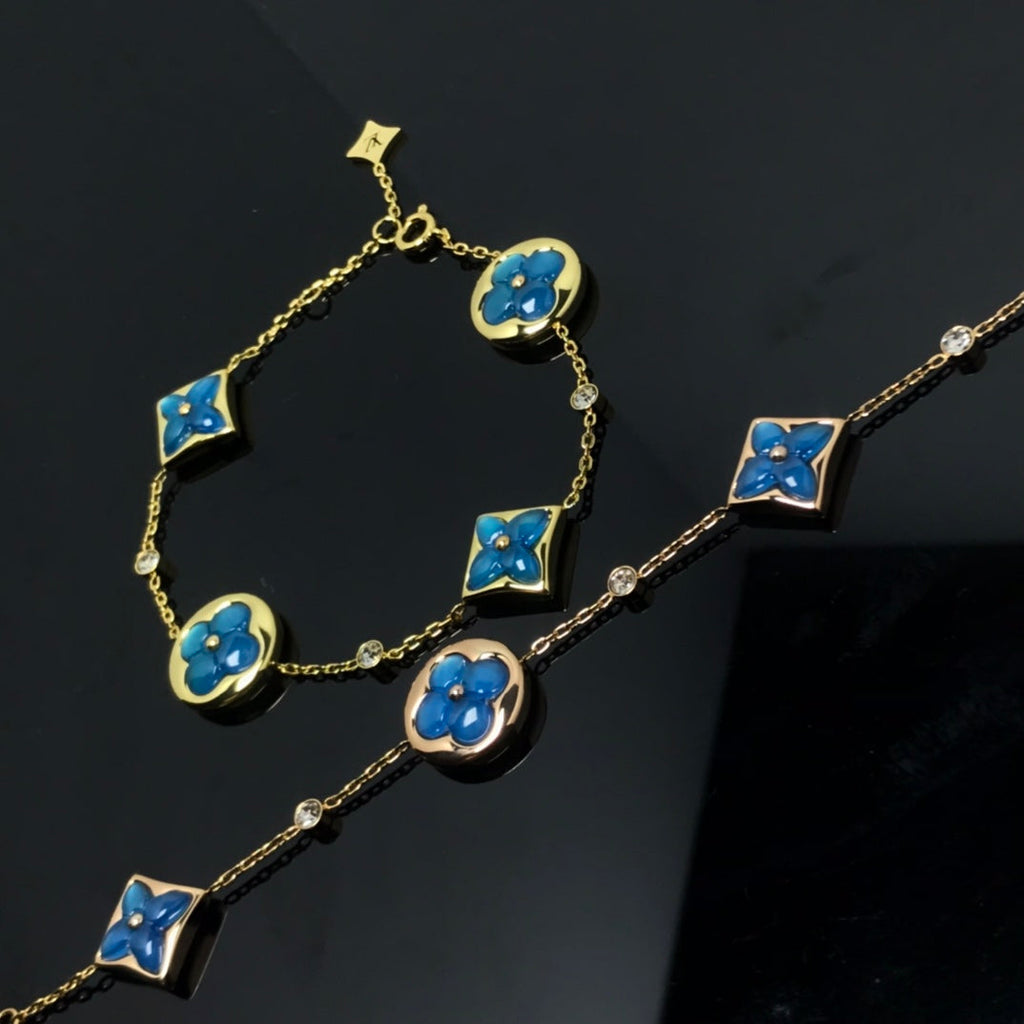 Aura STAR AND SUN 4 MOTIF BLAUES ARMBAND
