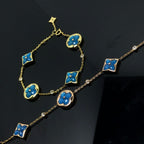Aura STAR AND SUN 4 MOTIF BLAUES ARMBAND